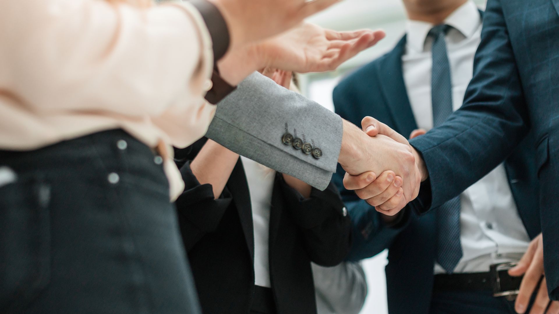 close up. business partners shaking hands in the office