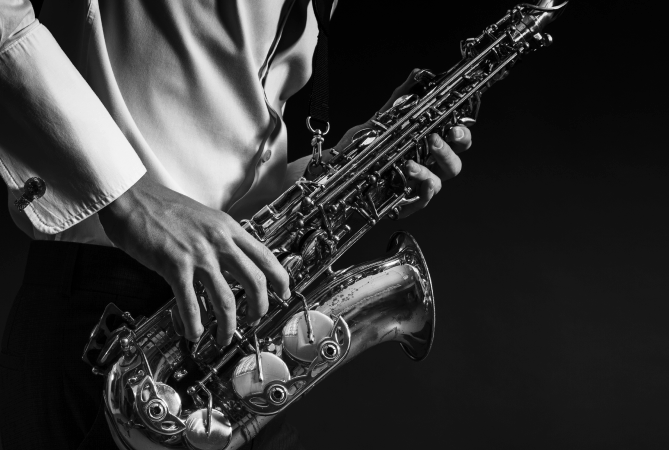 A person playing saxaphone.