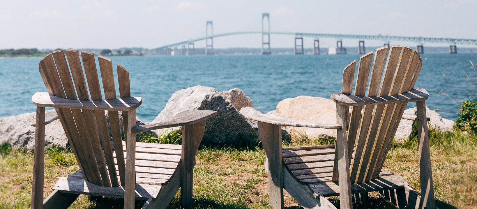 Two Empty Chairs Facing the Port Harbor