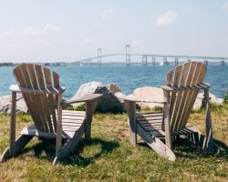 Two Empty Chairs Facing the Port Harbor